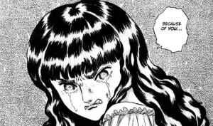 A picture of an angry looking young girl with dark, wavy hair. The text on the image reads "because of you..."