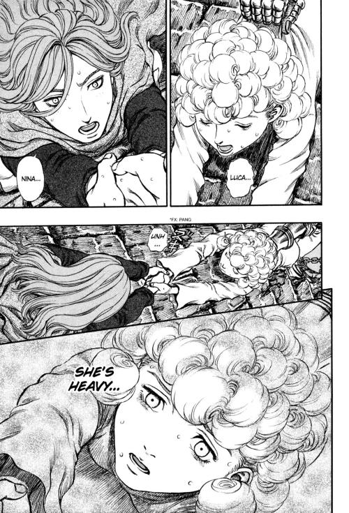 An image of a young, curly-haired woman about to drop her friend (also a young woman) from a building. Text on image reads "she's heavy."