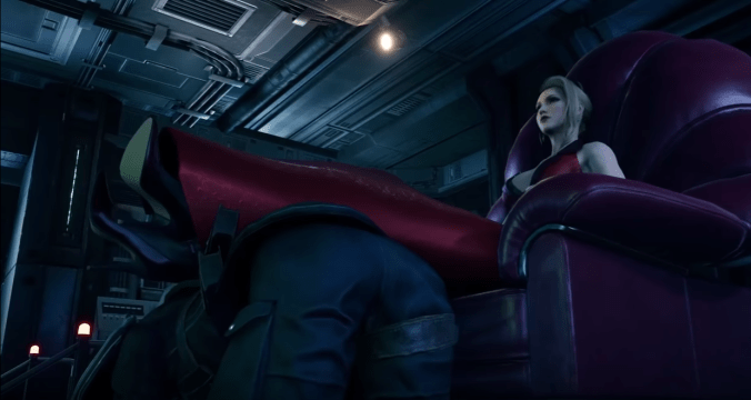 Women in a red dress sitting down and using a soldier as a footstool. Not as wild as it sounds.